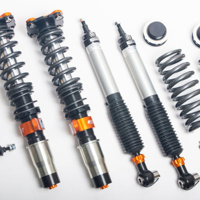 AST 97-06 BMW E46 5100 Series Coilovers (Incl. Top Mounts & Droplinks)