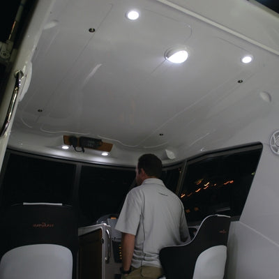 Hella 0500 Series Slim Line White 12V DC Round Soft LED Courtesy Light w/ White Plastic Rim